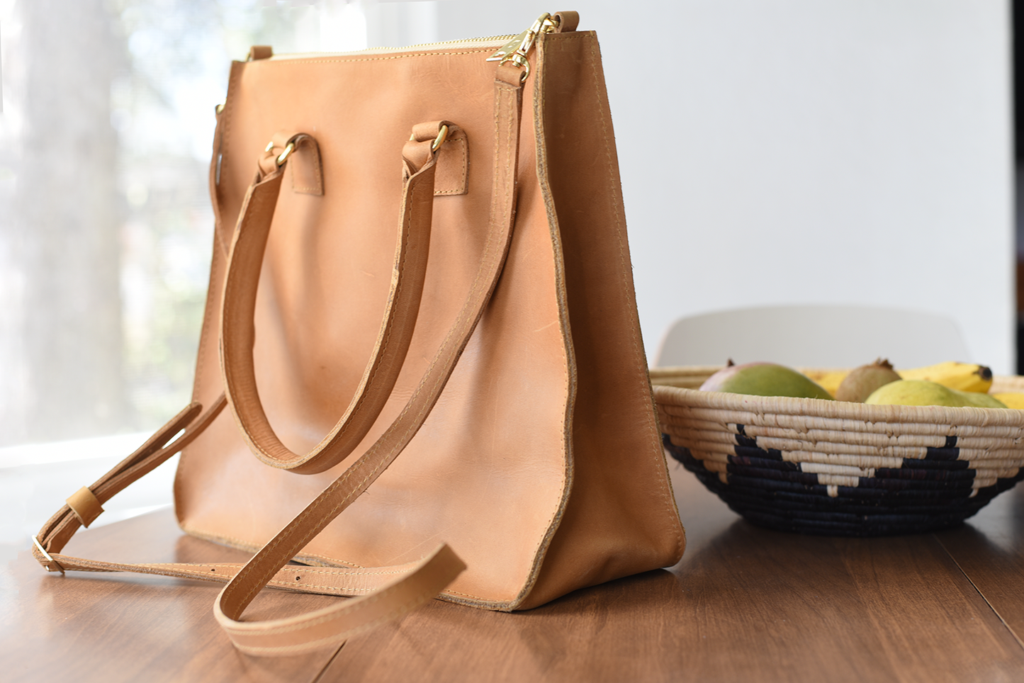 Custom embossed logos on leather handbags