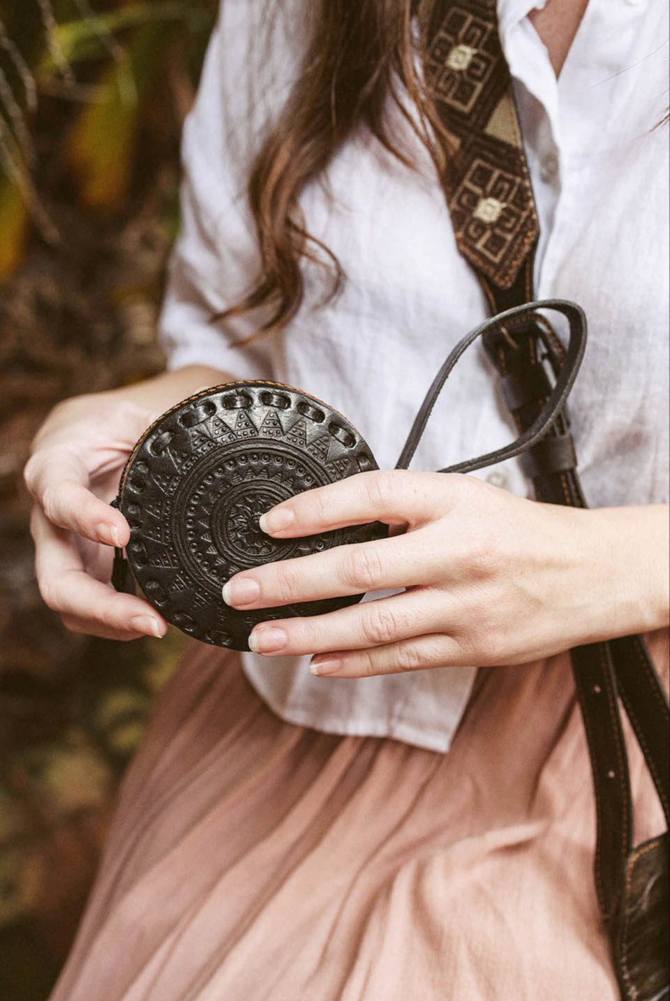Embossed Circle Leather Mini Wristlet
