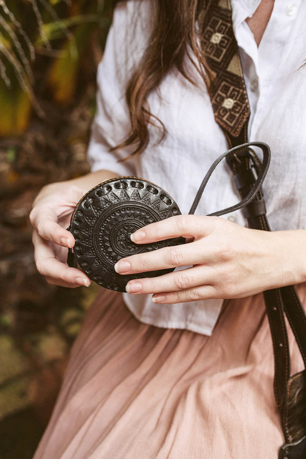 Embossed Circle Leather Mini Wristlet