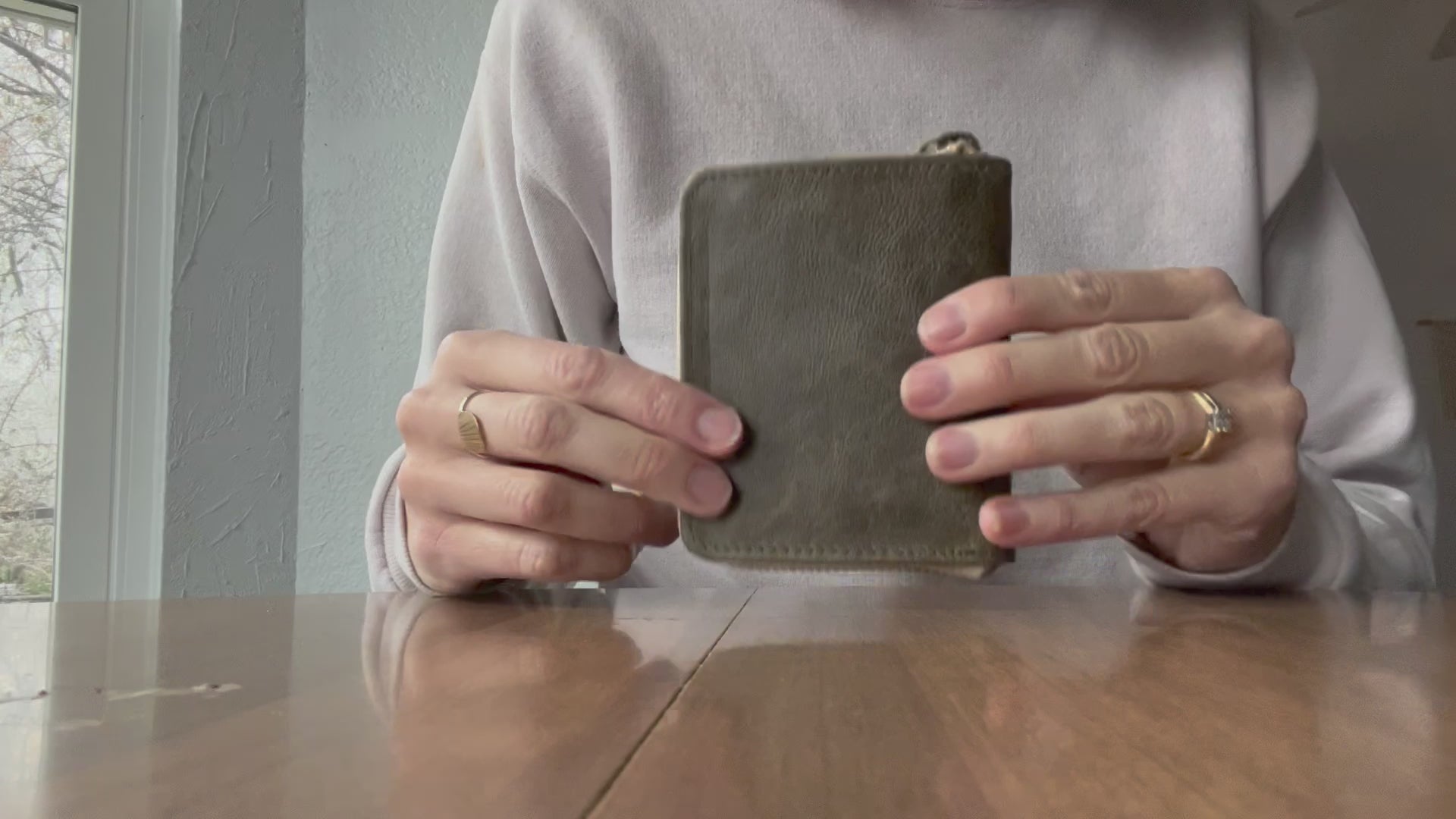 Ethically handmade green leather wallets